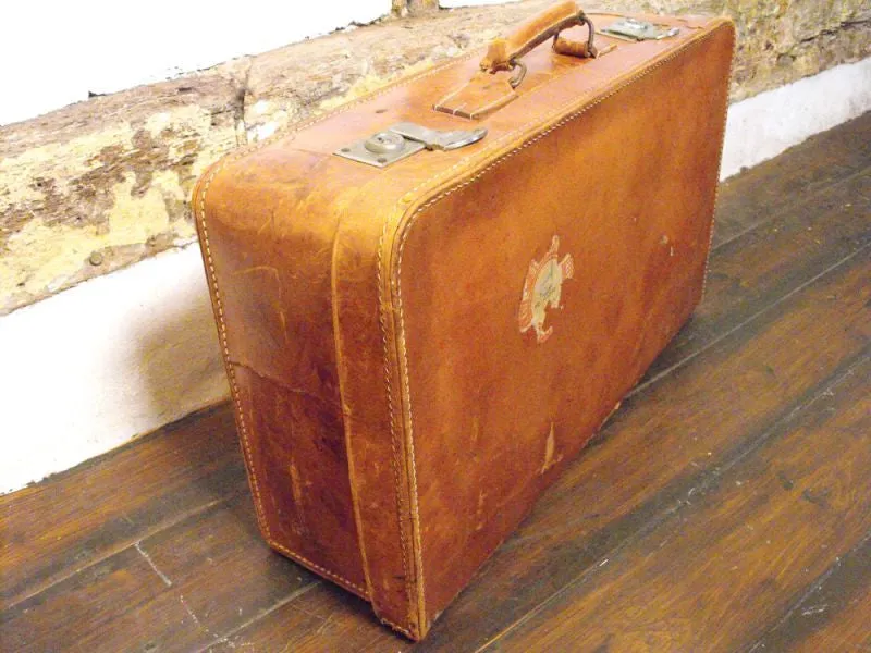 A Good Quality Vintage Leather Travelling Suitcase