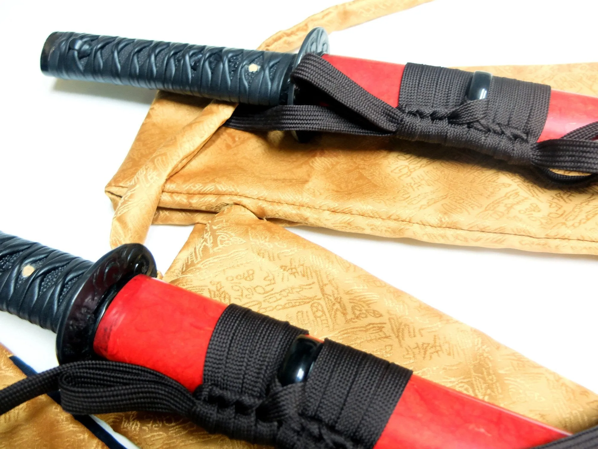 Daisho (katana and wakizashi pair) with red rice paper saya