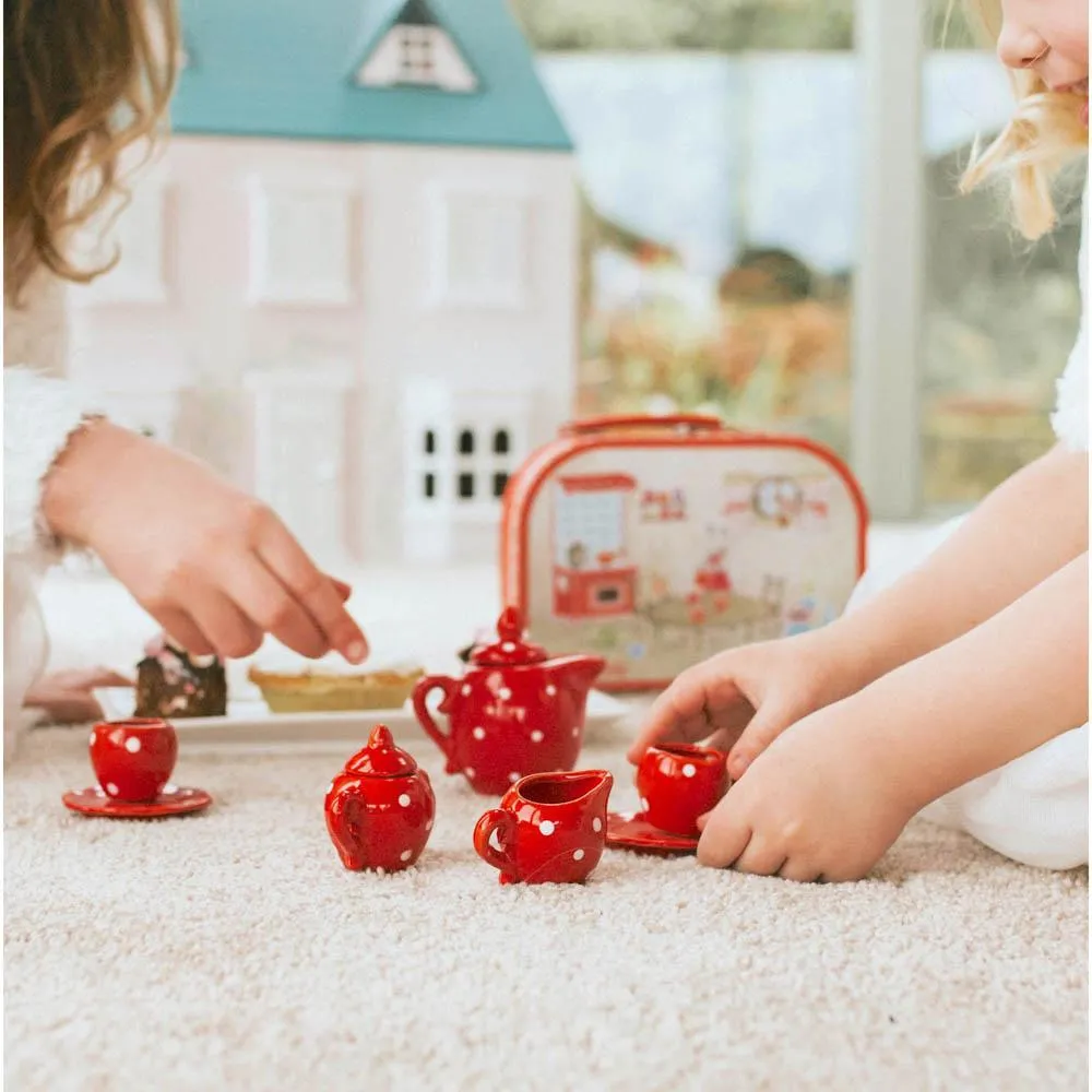 Moulin Roty red ceramic tea set in suitcase