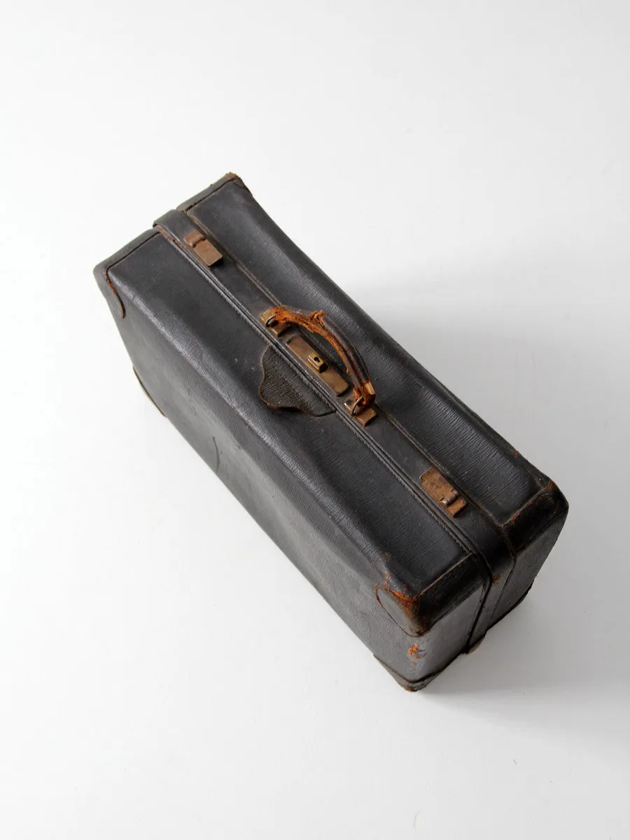 vintage black leather suitcase circa 1930s